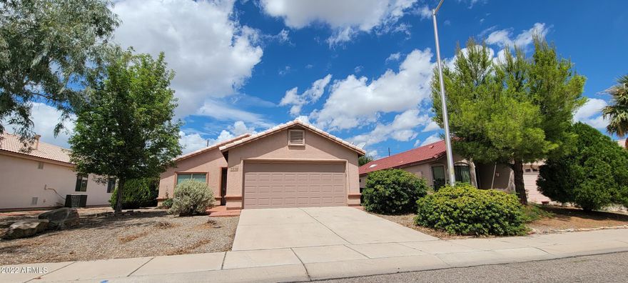 With prices going thru the roof, here is an opportunity to purchase a newer home and a great price ! This cute home has ceramic tile or laminate flooring through out the home making it very easy care. There is a large front room that could be a living/dining room or a large living room. There is a good size breakfast nook of the kitchen too. The master suite includes a large walk in closet and private bath. There is also a laundry room inside the house. The back yard includes a covered patio and low maintenance landscaping and a view of the mountains. Call me today for your private showing!