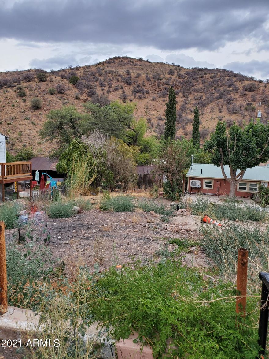 HARD TO FIND IN-TOWN LOT in MAMIE subdivision, Bisbee near the Courthouse! Super potential for a great home in OLD BISBEE!. .068 of an acre is big enough for one, two or three story home with all utilities on the lot. Lot size is:  31.34' wide x 94.17'' deep. Have fun building your turn-of-the-19th/20th century home (or modern one) in the UNIQUE Mountain Town. Live the casual Bisbee lifestyle in modern comfort! This location is CLOSE TO EVERYTHING!