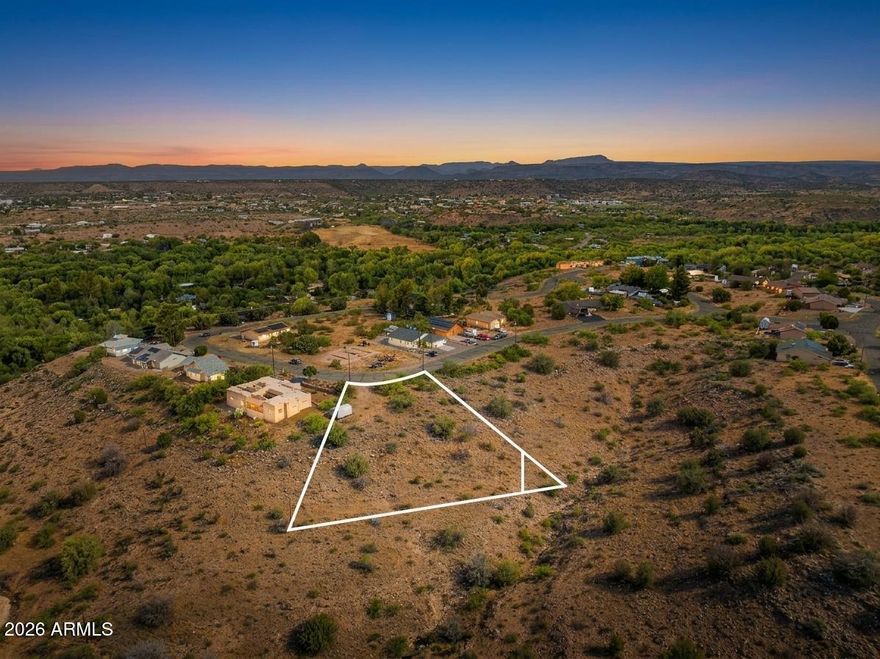 Framed by expansive, unobstructed panoramic views, this exceptional 0.61-acre parcel delivers a rare combination of space, setting, and flexibility in the heart of Rimrock. With no HOA restrictions and R1L-12 zoning designated for single-family homes, this property offers the freedom to design and build on your terms.
Gently positioned to maximize view corridors and natural light, the lot provides an ideal canvas for a custom residence, thoughtfully designed indoor-outdoor living, and long-term enjoyment of Northern Arizona's striking landscape. Utilities are available nearby, with septic installation required.
Whether you're ready to break ground or secure land for a future build, this larger than average, view-oriented, and unrestricted lot offers value, privacy, and possibilities!
