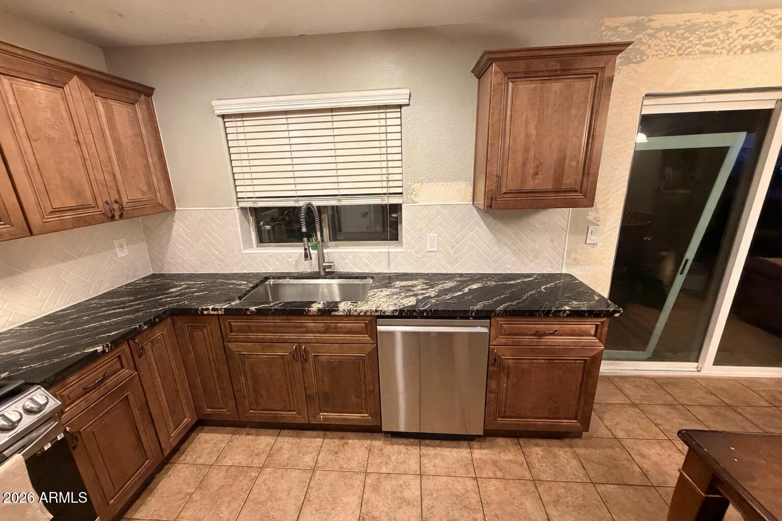 7937 W DESERT BLOSSOM Way