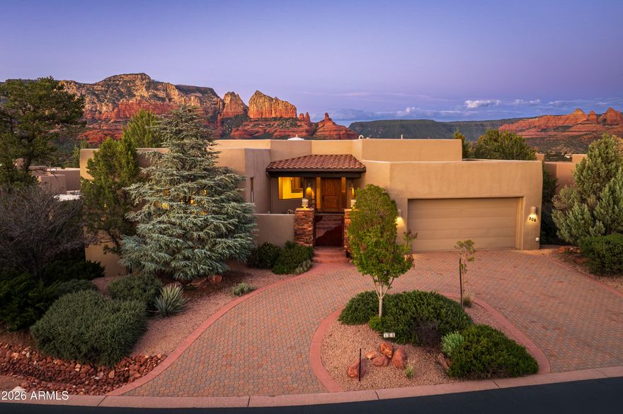 Luxury 3BD; 3.5BA 3,473 SqFt., custom home with incredible red rock views in the coveted gated Casa Contenta, offered turn-key. MAIN LIVING area with no stairs features a great room with dining, chef's kitchen with breakfast nook, primary suite, and a second guest bedroom with ensuite bath. Sitting deck captures stunning views. LOWER LEVEL offering a striking architecturally designed staircase to the lower level with a large family room, wet bar, 3rd guest suite with full bath, ample storage, and additional red rock views. Well-appointed kitchen with Viking gas range, Sub-Zero refrigerator, granite countertops, and center island. Pella windows, hardwood floors, tile, and carpet in bedrooms. Casa Contenta offers a clubhouse, pool, tennis, and pickleball. New elastomeric roof coating coming!