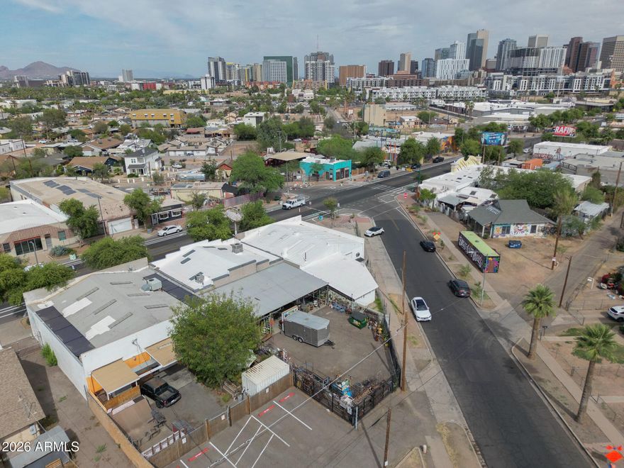 Chic Downtown Warehouse on a large lot. Built out office, kitchenette, bathroom and space for a retail, coffee shop or event space. Street entry is facing popular Grand Ave with garage door, pedestrian door and retail window. Rear parking and entry from Fillmore St.