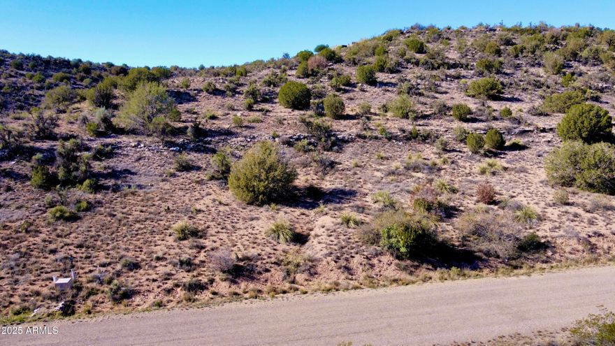 Get yourself a sunrise view in Thunder Ridge! Looking out over the Eastern hillscapes, this lot sits nicely on over 2 acres. Thunder Ridge lots are spaced out with natural desert landscape and room to enjoy it in mind. Owner may Carry with reasonable offer. Site-built homes only, min 1800 sq ft. Would need well and septic, so you would have your own water source!  Come see...