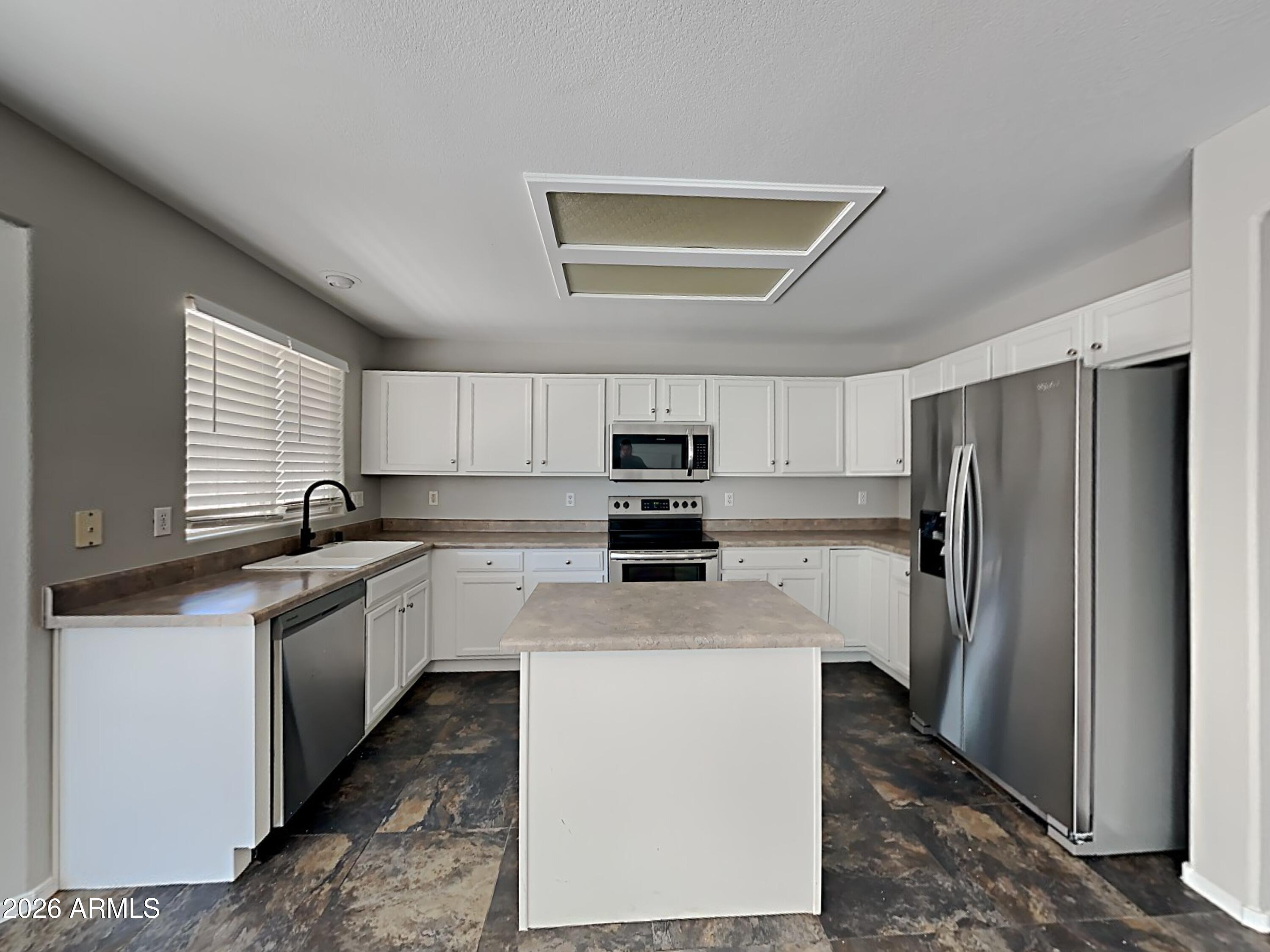 13019 W MONTEREY Way