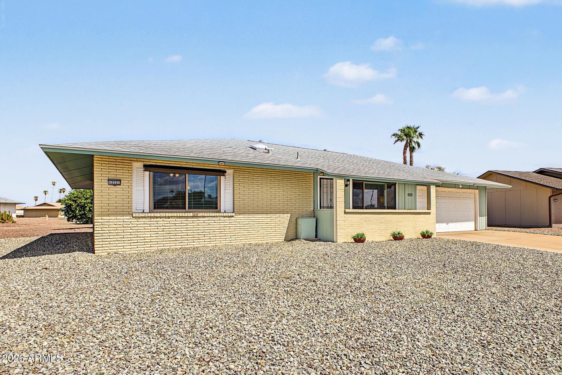 12221 N COGGINS Drive