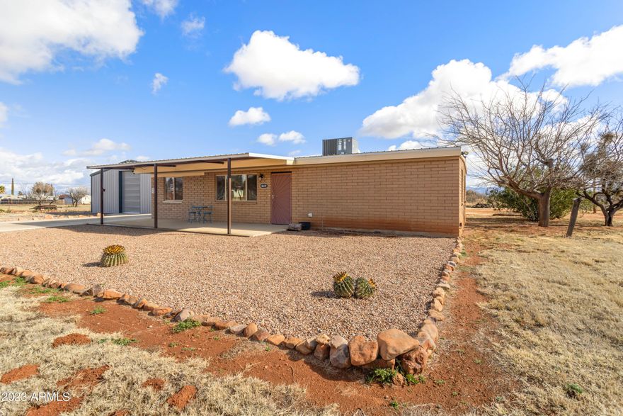 Need a SHOP and a house?? Look no further!!  
2 bd,1 bth remodeled home on 1 acre. Some handicap amenities already installed. Front & back patios have steel awnings. Bonus room for crafts, hobbies or even a 3rd bedroom possible. Spacious pantry/laundry room. Low maintenance yard. 100 ton of crushed asphalt on property for future drive. 
House features all new HVAC system, LP gas range, tank-less water heater, flooring, Low E efficiency windows throughout, insulated metal roof and more. 
3880 (40X97 built 2019) sf steel building (shop). Features three garage doors, one each on the west, south and north sides. Has LED lighting and plumbed for air complemented by a 60 gal compressor, Transom windows & 10K 2 post auto lift. Call for a private showing today!