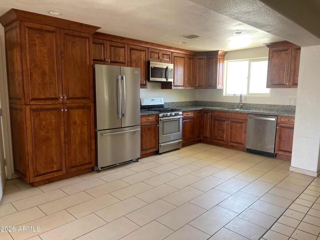 Photo of 520 W Mcneil Street, Phoenix, AZ 85041 (MLS # 7000555)