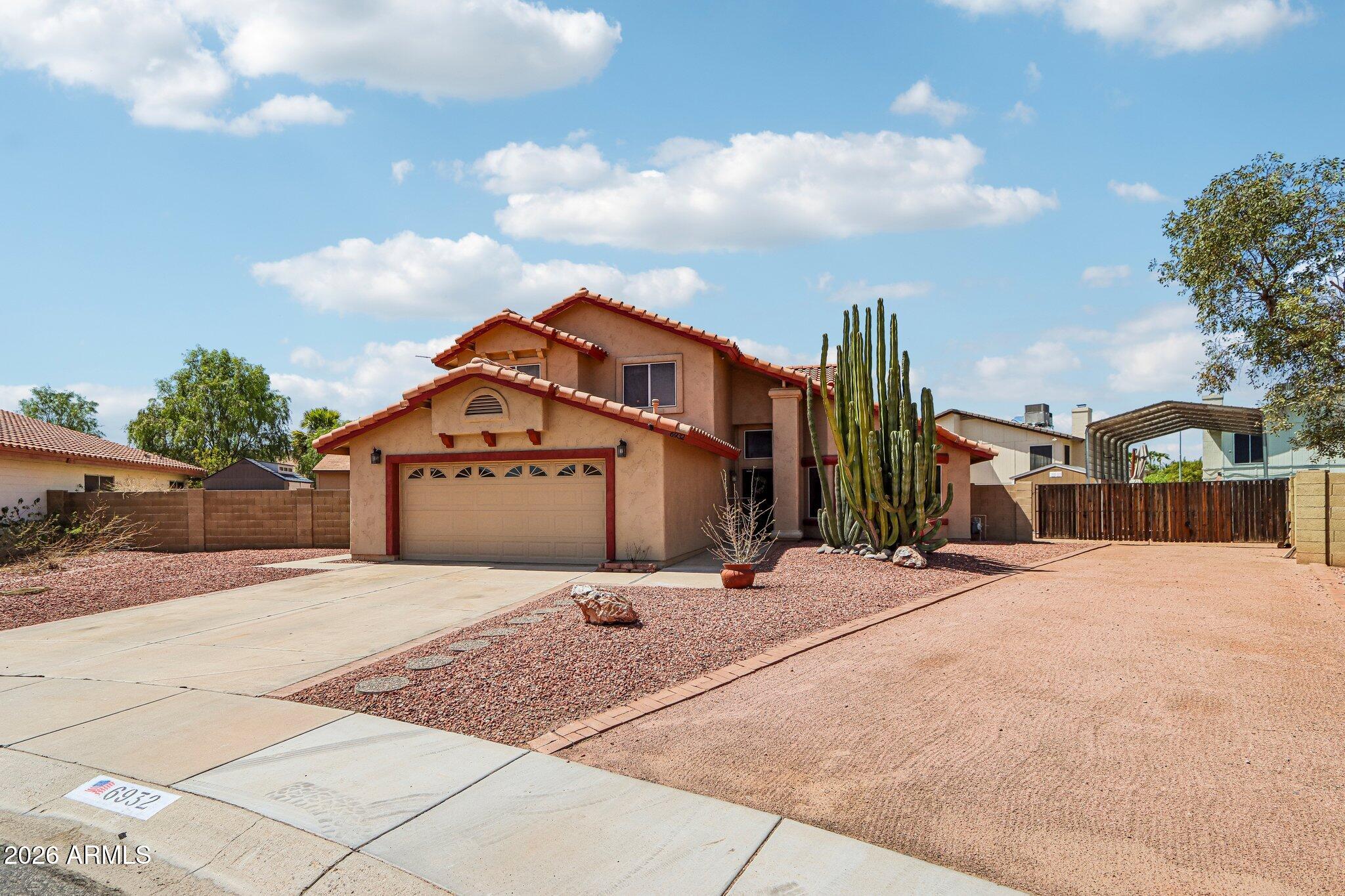6932 W CHARTER OAK Road