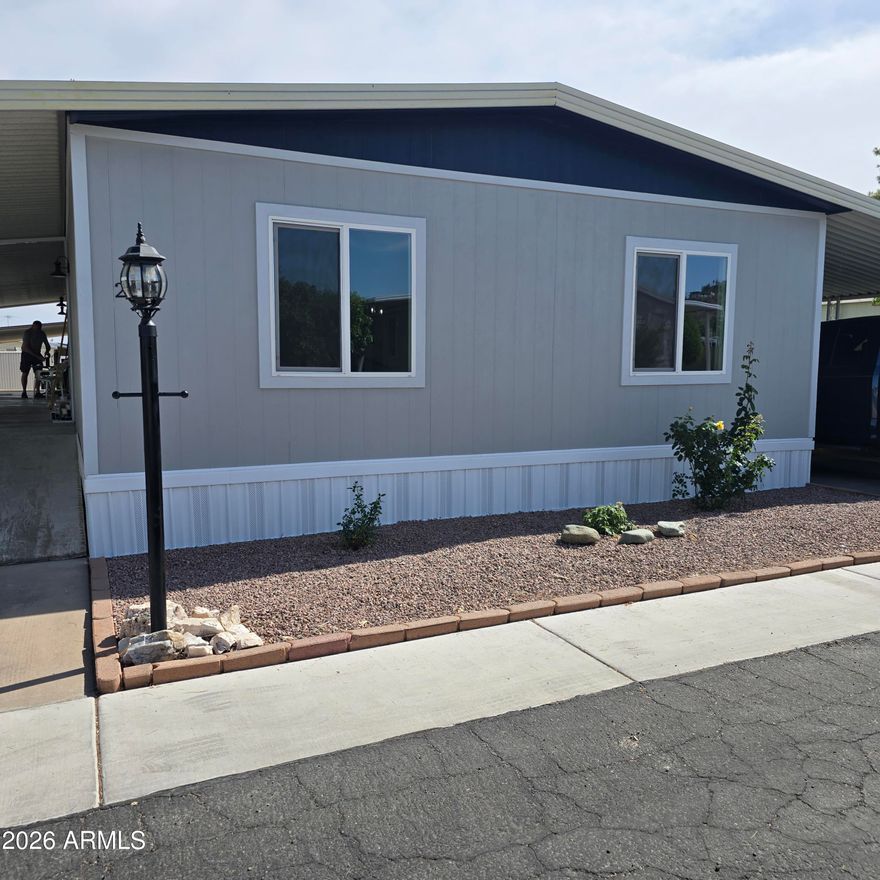 ON LEASED LAND:
This home is absolutely gorgeous!! It has been remodeled top to bottom. Ak drywall inside, 3 bedrooms, split floor plan, 2.5 bath!.  This is a must see.  Step inside to this home with vaulted ceilings.  Open front room to dining and kitchen. State of the art kitchen new cabinets, appliances and enjoy breakfast on the large breakfast bar. Primary is split floorplan, other 2 bedrooms on the other side of home.  Both bathrooms have custom showers, plenty of storage. Outside enjoy the screened front porch and a storage unit.  Large carport.

Paradise Shadows is a 55 plus age restricted resort community. Features include an indoor pool and spa to enjoy year round.  Lots of activities.