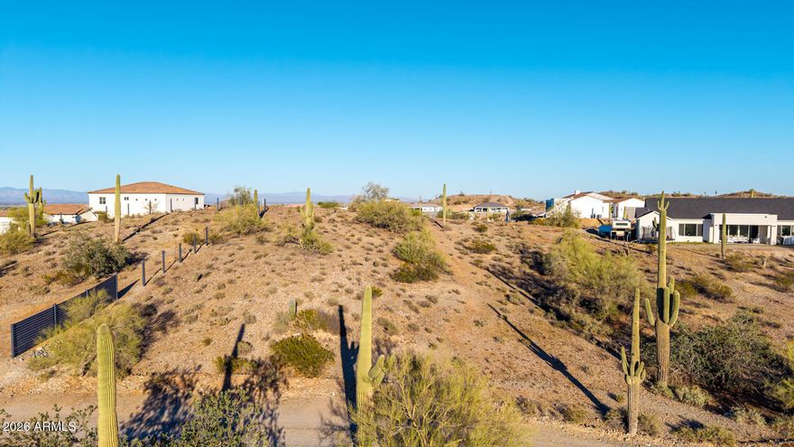Discover a rare opportunity to own a spectacular 1.25-acre view lot! Featuring wide-open skies, glowing city lights, and fantastic mountain vistas creates the perfect backdrop for your future dream home. This prime custom home site provides the ideal setting to design the home you've always envisioned, with utilities available and no HOA for added flexibility. The property is also designated as a horse property, giving you plenty of space for equestrian amenities or simply enjoying the open desert surroundings. Conveniently located minutes away from golf, schools, and a sprawling 10,000-acre park. Lots like this are becoming increasingly hard to find! Don't miss your chance to make it yours!
