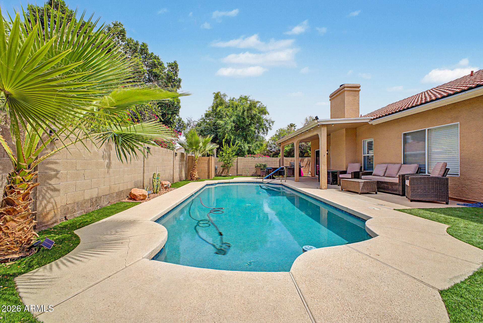11216 W OLIVE Drive