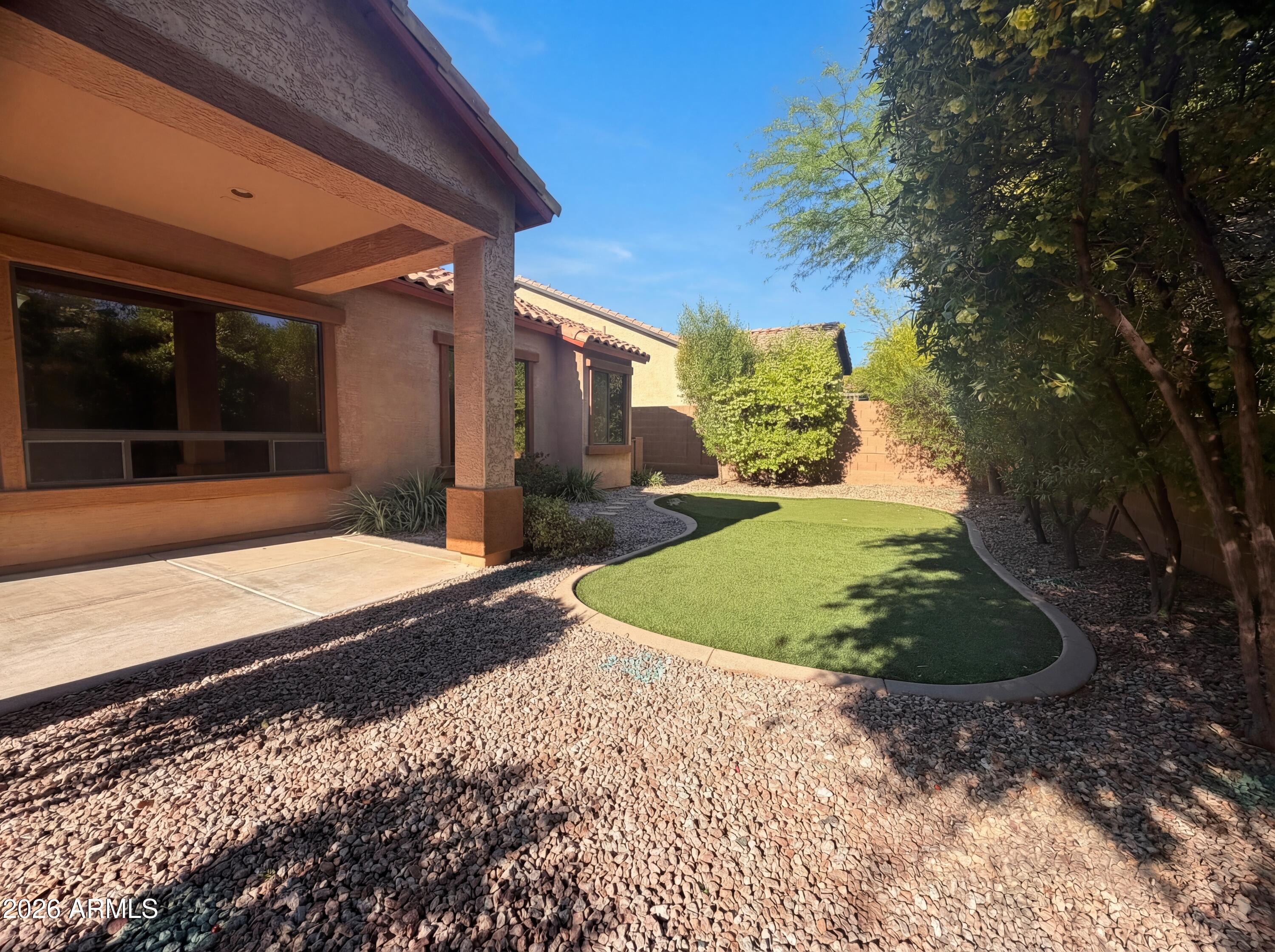 6915 E PORTIA Street