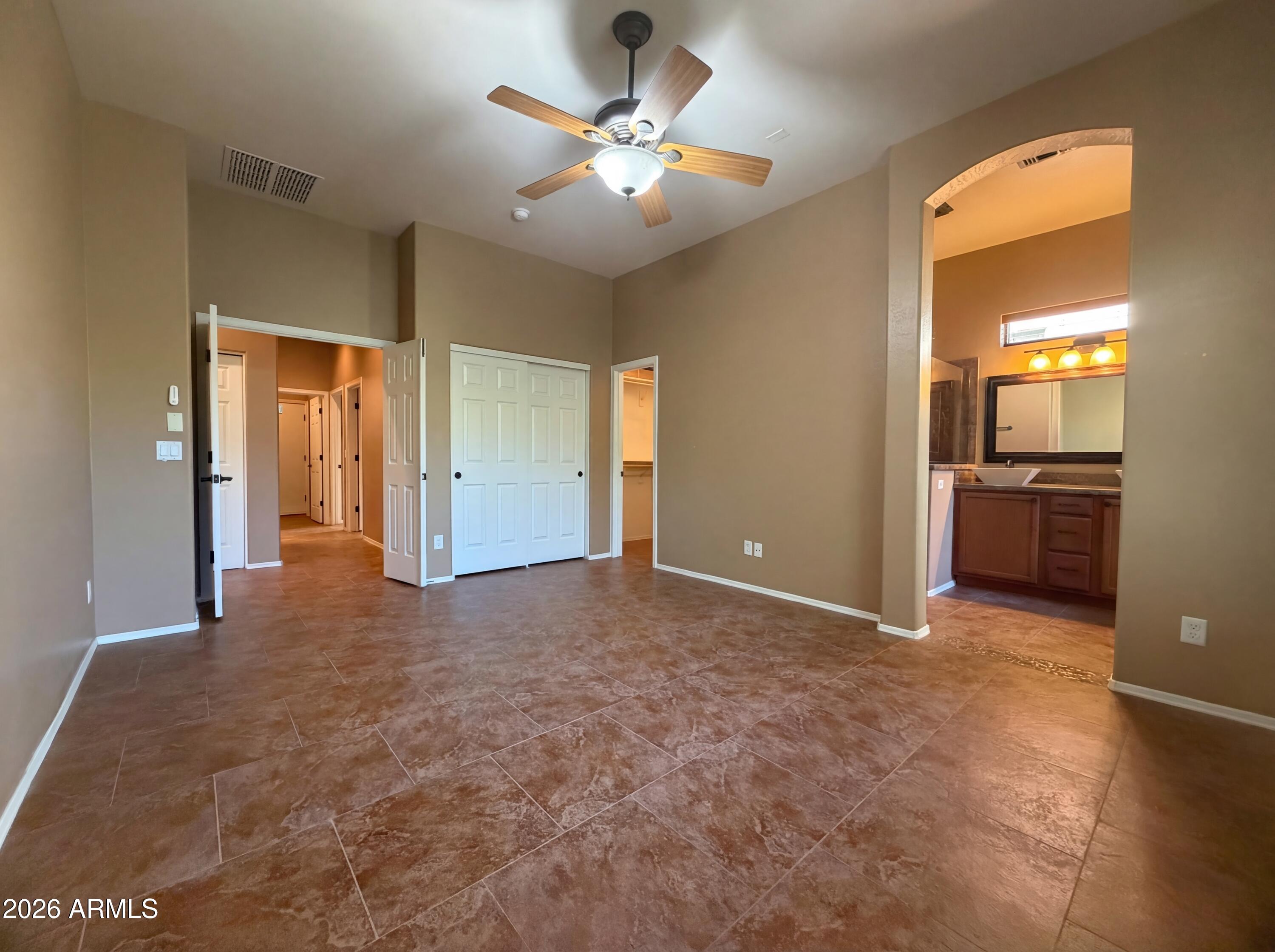 6915 E PORTIA Street