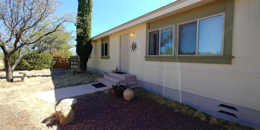 This cut home is ready for new owners. The home surrently sits on just over an acre but there is an adjacent 2.07 acre parcel next door, mls#6226077 that is also available for sale. The home features 3 bedrooms and 2 baths. There is an open floor plan too. Newer windows, furnace and ac will make your utilities very reasonable. There is a carport as well as 2 good sized outbuilding to use for storage, man cave or ??? This great property will not last. Call today for your private showing. American Home Shield Home Warranty is in place for the new buyers! Includes APN 104-08-110