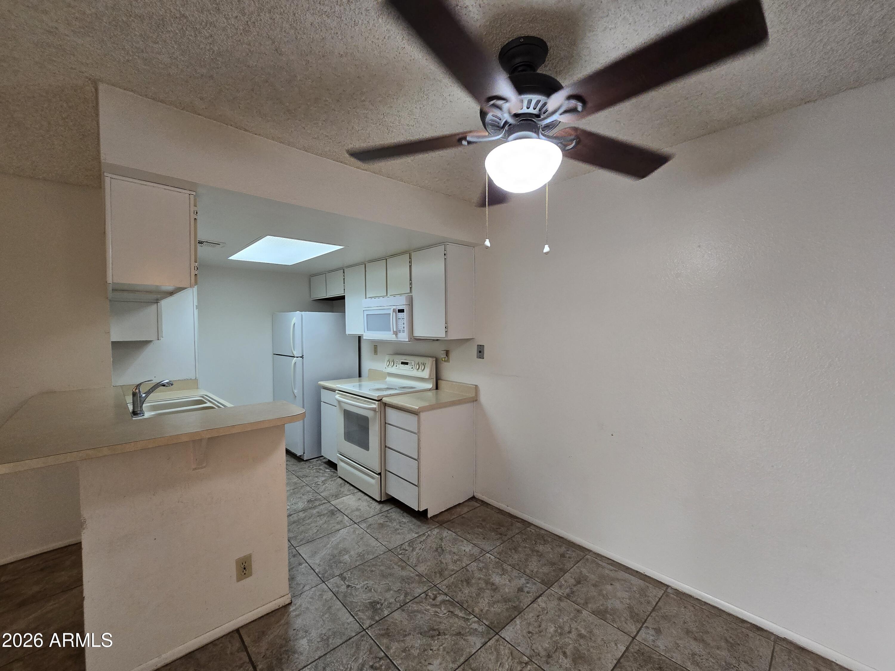 1111 E UNIVERSITY Drive 102