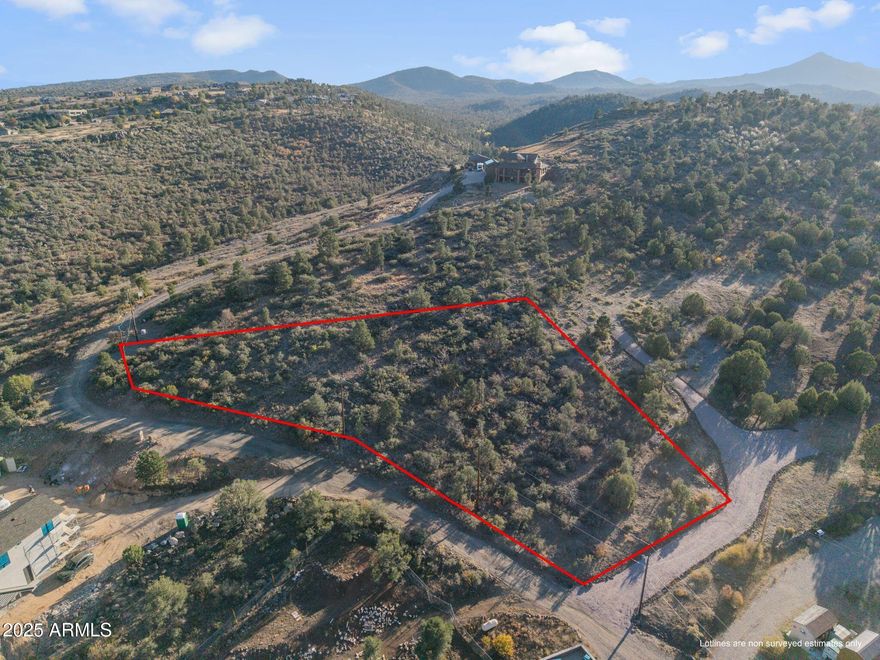 Discover the perfect canvas for your dream home at the base of iconic Granite Mountain. This exceptional vacant parcel offers wide open panoramic views in every direction-sunrises, sunsets, and starlit skies. Electricity is available & new owners can hook up to Granite Mountain Water Co. Enjoy abundant wildlife, privacy and the peaceful natural setting just minutes from local amenities. Only Site Built Homes with 2200 square feet minimum with 2 car garage required. 6' height maximum for fencing.