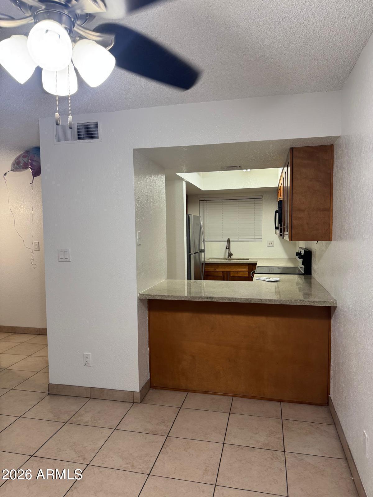 1545 E SAHUARO Drive 15