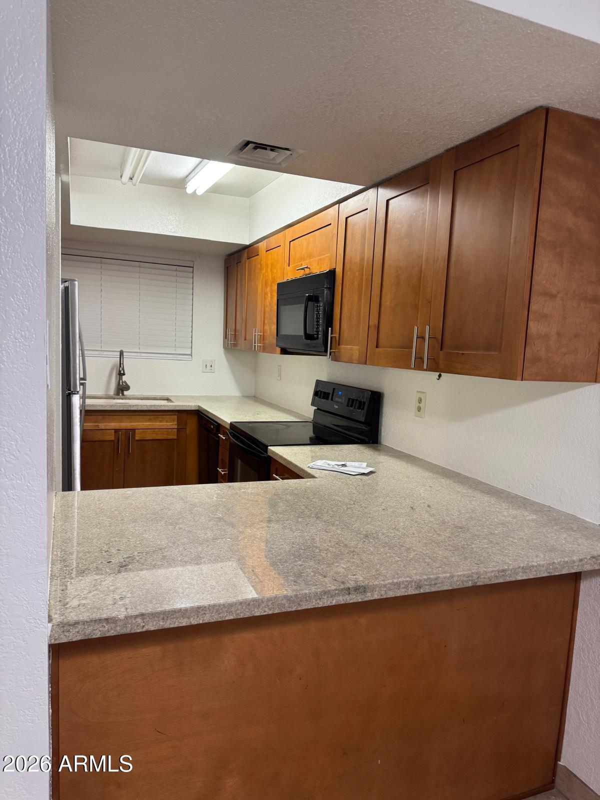 1545 E SAHUARO Drive 15