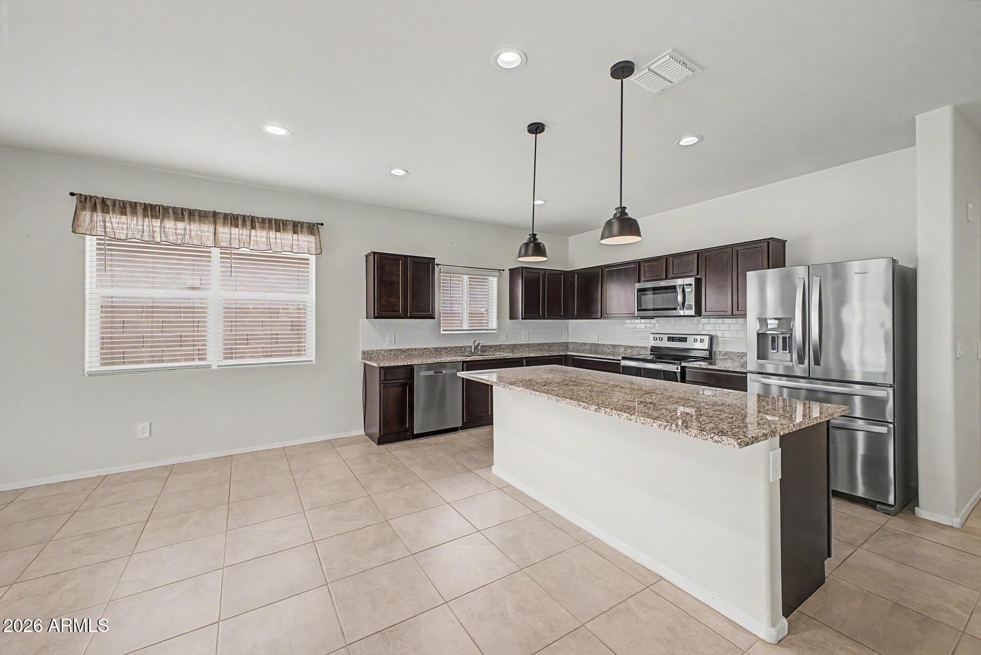 18363 W Whispering Wind Drive