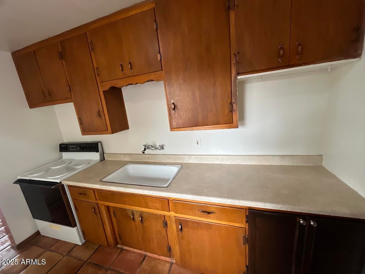 7153 N 57TH Drive Apt 1