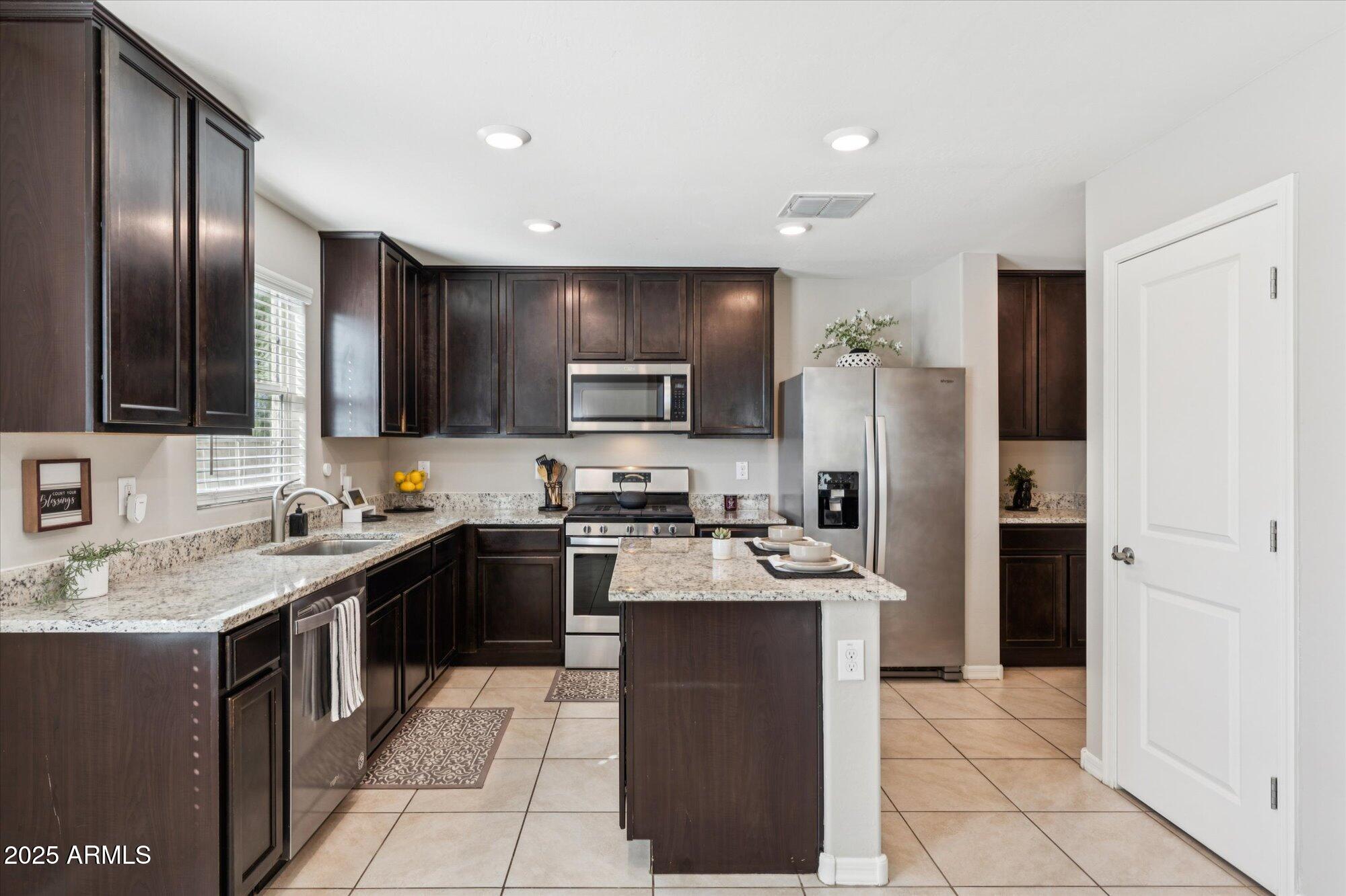 8244 W ALBENIZ Place