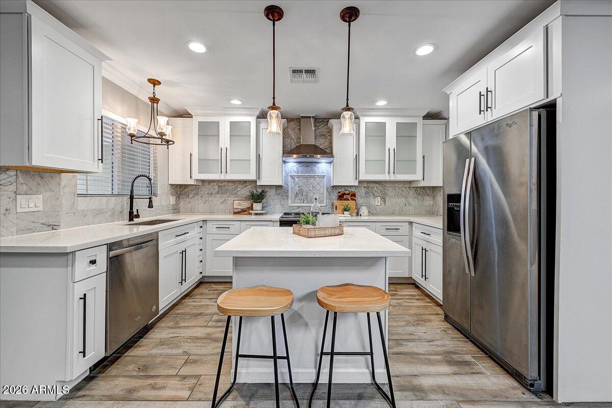 7651 E Coolidge Street