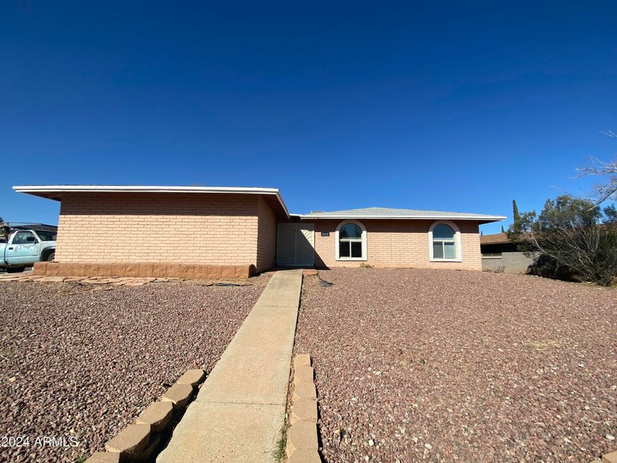 Welcome to your new home! 
Inside you will be pleasantly surprised with the spacious floorplan. A bright and inviting entry leads you directly into one of the TWO living spaces. The beautiful rock fireplace is perfect for the cooler days. You will find WIDE hallways, plenty of storage closets and both bathrooms have double sinks. The main bedroom boasts double entry doors, a walk in closet and a separate den/office to make into your private retreat. This home has so much to offer and is one of the only homes in the area with a FULL BASEMENT!! Downstairs you will be happy with the extra large living room space and 2 more bedrooms. This home is also located on a large corner lot and has recently been painted. Do NOT wait, see it before its GONE!!