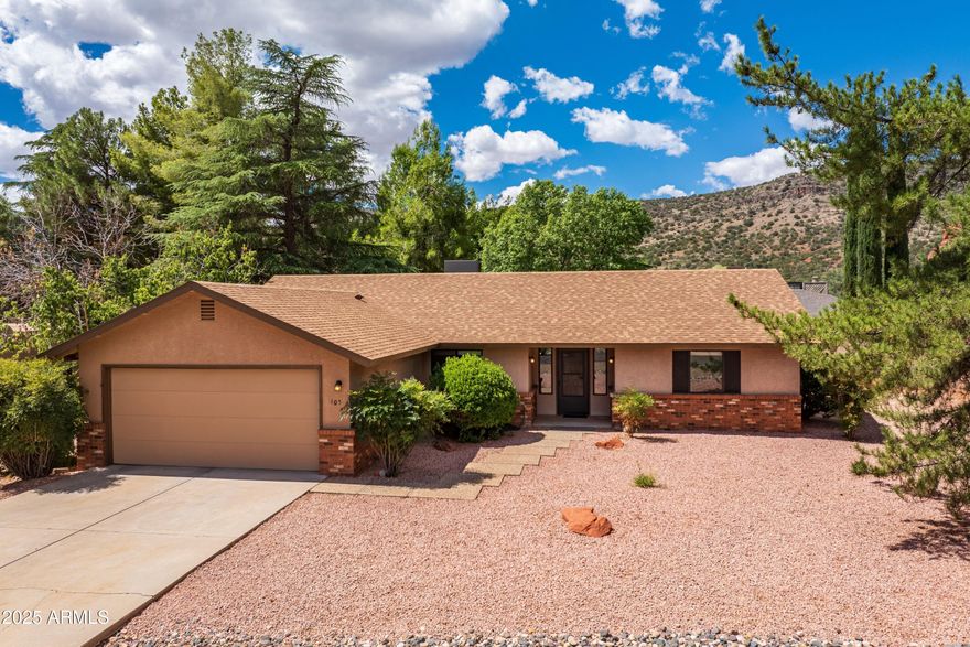 Beautifully updated 3 bedroom, 2 bath all electric home with a split bedroom floor plan, 2-car attached garage, located on a quiet street near 2 golf courses.  The kitchen & both bathrooms have been completely updated, including all new light fixtures, bathroom vanities & faucets, ceiling fans, and full interior paint. High grade laminate and tile flooring throughout, no carpeting! Living room with a wood burning stove, new HVAC system installed 2022.  Generous size master bedroom with sliding glass doors out to the covered rear patio. Double sinks, separate toilet room, and 2 closets in the master bathroom.  2 guest bedrooms with a full bath between them.  Sliding glass doors from the dining area out to the covered rear patio and back yard, lots of shade trees.  Come see all the changes!