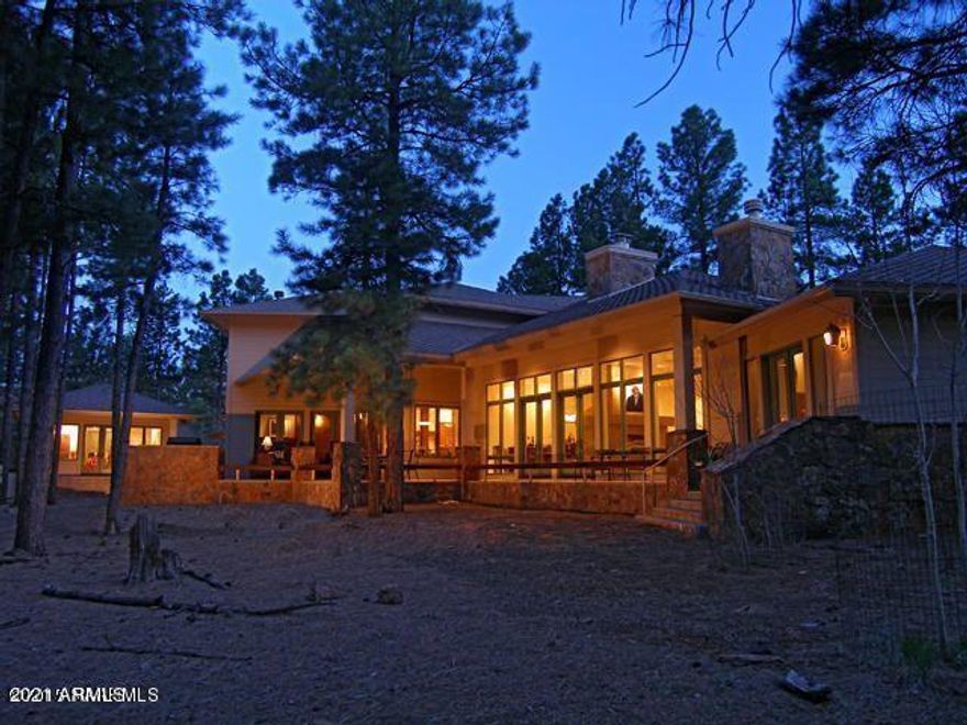 Lot 779- New/additional photos coming soon.

Amazing home in one of the most sought after locations within Forest Highlands. Panoramic views of golf course and lakes from both the main house and the detached studio. Multiple living areas provide wonderful separation for the kids and extended families. Close to the Meadow clubhouse and all the amenities, restaurant, pool, recreation area, fitness center and golf course. This spectacular home is complete with all of the finest materials and the floorplan suits both large families and small. Complete with 3 car garage, in-floor and forced air gas heat and central A/C.