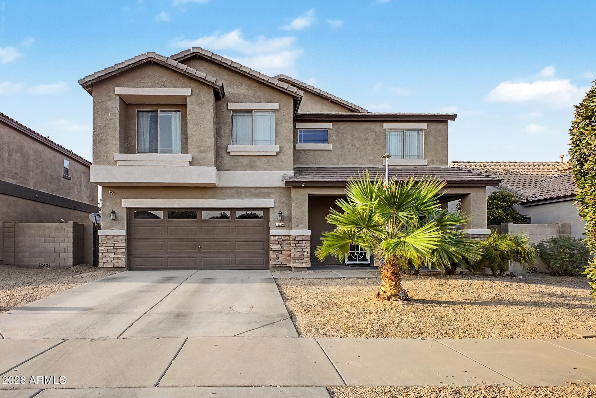 14136 W GELDING Drive