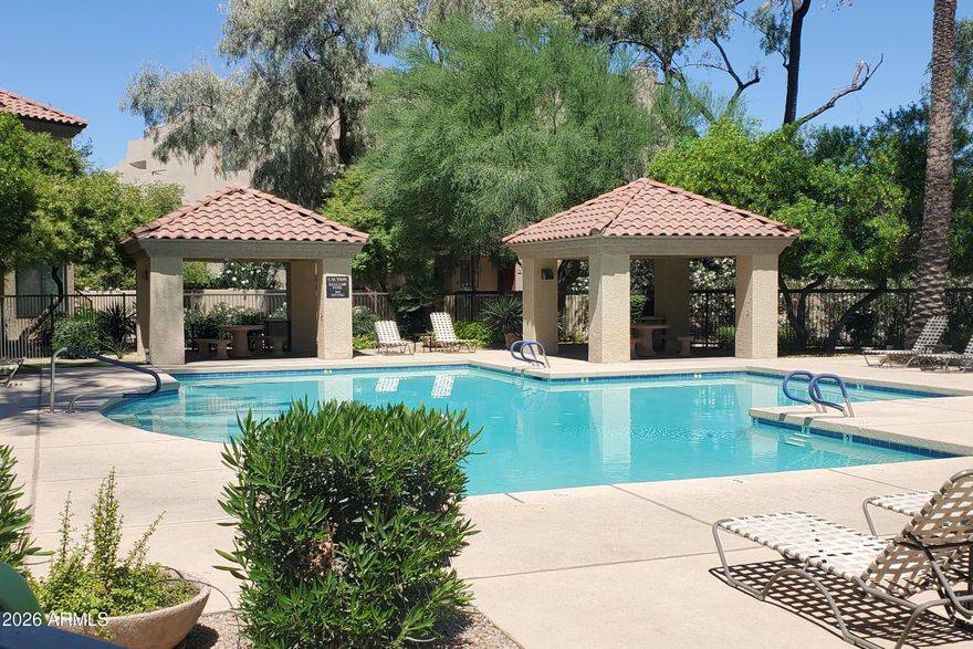 Best Price and Excellent Location in Scottsdale near the Upscale Redeveloping P.V. Mall area with Premier Shopping, Dinning & Amenities GALORE! To name a few; Flower Child, Life Time Fitness, Whole Foods, Trader Joe's, Fry's, The Vig, Costco and more. This 2BR/2BA in Gated Tuscany Villas Condo Resort Community offers a clubhouse, heated pool & spa, workout facility & borders Stone Creek Golf Course with paths for jogging, biking & walking. This bright end-unit features an open floorplan, balcony access off living area with Mountain views! Washer/dryer, fridge included & is available fully furnished, even Turn-key if desired. Covered Parking Space convenient to Entry/Stairs. Gently lived in as a second home 2- 3 months/year. New HVAC! Come view this great unit for yourself before it is gone