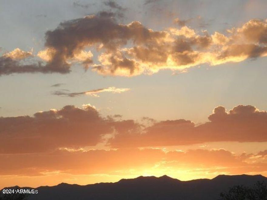 pectacular property with gorgeous 360 view of the Dragoon Mtns and Whetstone Mtns. Dragoon Mountain Ranch subdivision is in St David AZ. The ranch consists of approximately 14,000 acres and adjoins 52,000 acres of the Coronado National Forest wilderness area. The ranch is also adjacent to thousands of acres of State Trust lands. Both the National Forest and State Trust lands provide a wildlife sanctuary. Originally the Horse Ranch was established in the 1800's. Cochise Stronghold is in the Dragoon Mnts. The adjacent Dragoons as well as the Rincons range to an elevation of over 7000 feet. Nearby towns and cities are Benson, Bisbee, Tombstone, Willcox and Sierra Vista all in Cochise County.Tucson approx an hour drive from the ranch