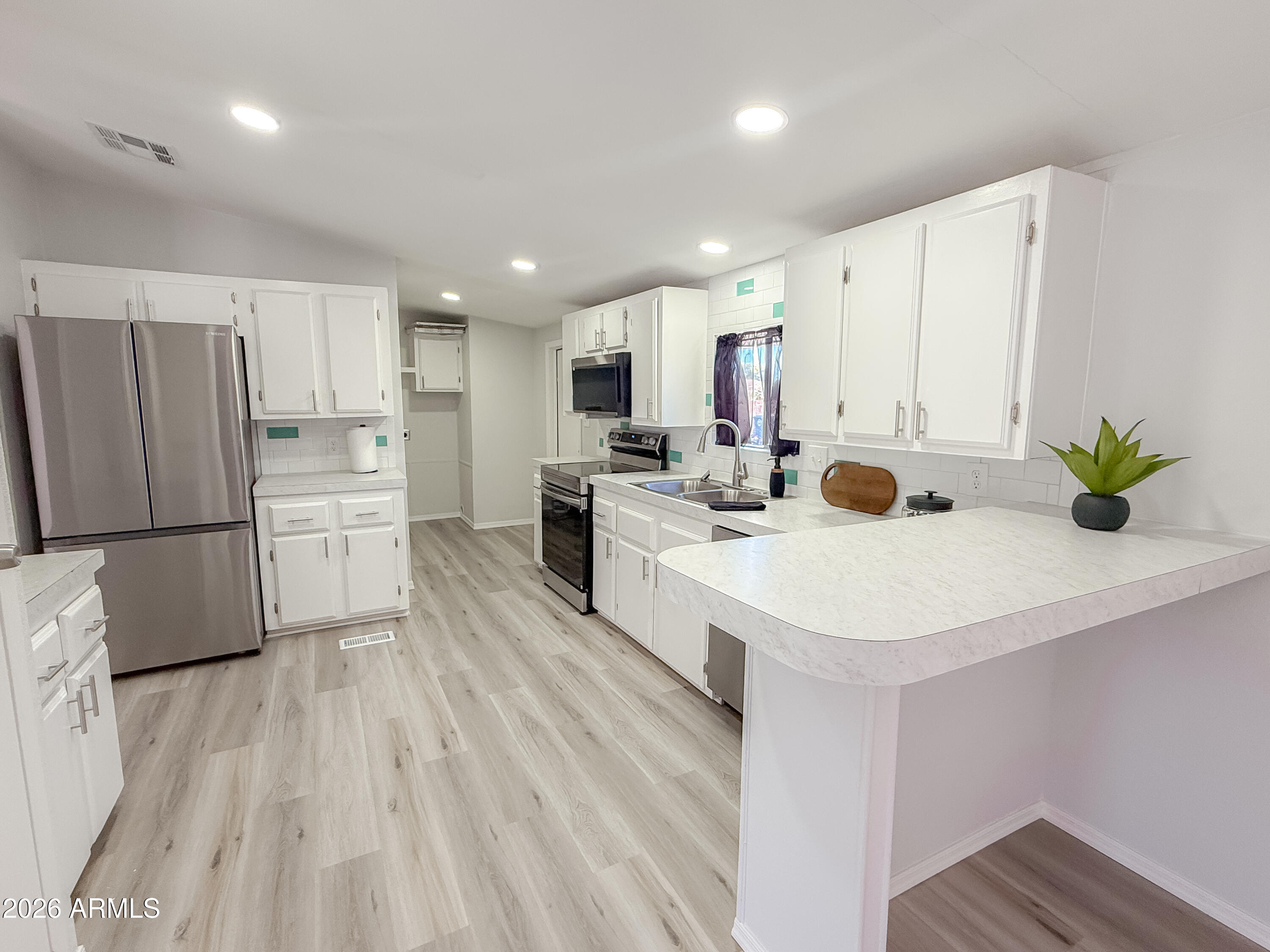 12721 W Greenway Road 39