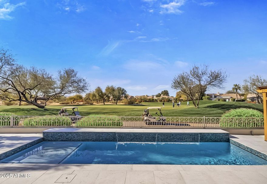 Gorgeous, State-of-the-Art Smart Home Directly on the First Hole of the TPC! 
Directly situated on the First Hole of the Prestigious TPC Stadium Golf Course, home to the iconic Waste Management Phoenix Open, this breathtaking, completely renovated Smart Home offers an Exceptional Living Experience with Irreplaceable Views in the Heart of Scottsdale. Meticulously rebuilt over three years, this residence seamlessly blends cutting-edge technology, world-class finishes and a prime location to create an entertainer's dream. The expansive open floor plan, custom design elements, and luxurious upgrades throughout make this property truly one-of-a-kind.

As you step through the custom 6' double steel entry door, The Beast, imported from Ireland, you are welcomed into a grand foyer, where a Limited Edition Peter Lik Acrylic Artwork featuring Horseshoe Bend, an Arizona Natural Wonder, is showcased above a one-of-a-kind Acacia wood entry table from Thailand. The chef's kitchen is nothing short of spectacular, featuring Scandinavian White Oak cabinetry with German slow-close hinges, 2.5" thick Calcutta Gold Quartz countertops, and Dacor Wi-Fi-enabled appliances. The massive 11' x 6' Calcutta Gold Quartz Island serves as the true centerpiece of the kitchen, offering an inviting space to gather and entertain.

The home's design effortlessly connects indoor and outdoor living, made possible by the 24' x 10' Precision Automation Stacking Pocket Doors, which open up to a spacious and beautifully designed outdoor living area. The office or optional bedroom features European Steel French Doors and a hidden Steel Vault Door that leads to a state-of-the-art Safe Room with 14-gauge steel panels, dedicated Wi-Fi, and a climate-controlled environment, perfect for those seeking security and privacy.

Each of the bathrooms provides a spa-like experience, with gorgeous Starfire Glass. The private backyard is an entertainer's paradise, featuring 24x24 Michelangelo Porcelain Pavers, a Saltwater Pebble Sheen Bella Blue Pool, LED multi-colored lighting, and a fully automated Aqualink Pool System for ultimate convenience.

This home is fully equipped with whole-home automation, including Lutron lighting, built-in Surround Sound, integrated iPads, and automatic day and night shades in every room. The property also boasts a comprehensive security surveillance system, a high-efficiency HVAC system with Trane XV18 air conditioners and a Whole House Surge Protector.

The garage is climate-controlled and designed for both luxury and functionality, featuring Epoxy Floors, a Hi-lift insulated garage door, ideal for car enthusiasts and a Versa Lift garage storage elevator for added convenience.

Additional premium systems include a whole-house Aquasana Rhino Max Flo water filtration system and a Rinnai Super High-Efficiency tankless water heater, ensuring that no expense has been spared in creating the perfect, turn-key property.

Located within walking distance of the Fairmont Scottsdale Princess, a Luxury 5-Star Resort and Spa, the TPC Stadium and Champions Golf Courses and minutes away from Mayo Clinic, Scottsdale Quarter, Kierland Commons and Westworld, which hosts the iconic events like Barrett Jackson Car Auction and the Arabian Horse Show.

With Stunning Unobstructed Golf Course Views, Sophisticated Technology, Luxury Appointments, and Timeless Design, this is your Rare Opportunity to own a truly ONE-OF-A-KIND home in one of Scottsdale's most sought-after locations.