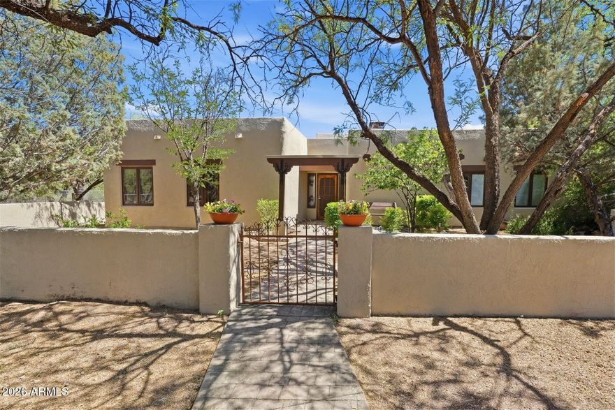 An exceptionally rare opportunity to own 20 private acres along the Bobocomari River, offering space, versatility, and a peaceful connection to nature. Surrounded by beautiful views and quiet desert landscape, this property invites you to slow down and enjoy wide-open skies, abundant wildlife, and the serenity of rural living.

The 2,259 sq ft custom home, built in 1986, features 3 bedrooms and 2 bathrooms with warm Saltillo tile flooring, a wood-burning fireplace equipped with a blower and integrated ductwork for efficient heating, and a kitchen complete with stainless steel appliances. The home opens to inviting patios and courtyards designed for relaxing and taking in the natural surroundings. 

Outdoor amenities make this property truly special, including a custom steel-roof gazebo perfect for enjoying birds, wildlife, and Arizona's stunning sunsets. The property also includes two spacious outbuildings offering exceptional flexibility. One shop measures approximately 40'x20', while the second 50'x30' building features a dedicated black room and print shop area equipped with mini-split systems, ideal for creative work, hobbies, storage, or business use. A large 40'x30' greenhouse provides excellent space for gardening, growing, or homesteading pursuits.

With fenced areas surrounding home and along the front and side property boundaries, this versatile parcel is ideal for those seeking a homestead, retreat, workspace, or simply room to breathe. Properties offering this level of privacy, usable acreage, and natural beauty are increasingly hard to find.
