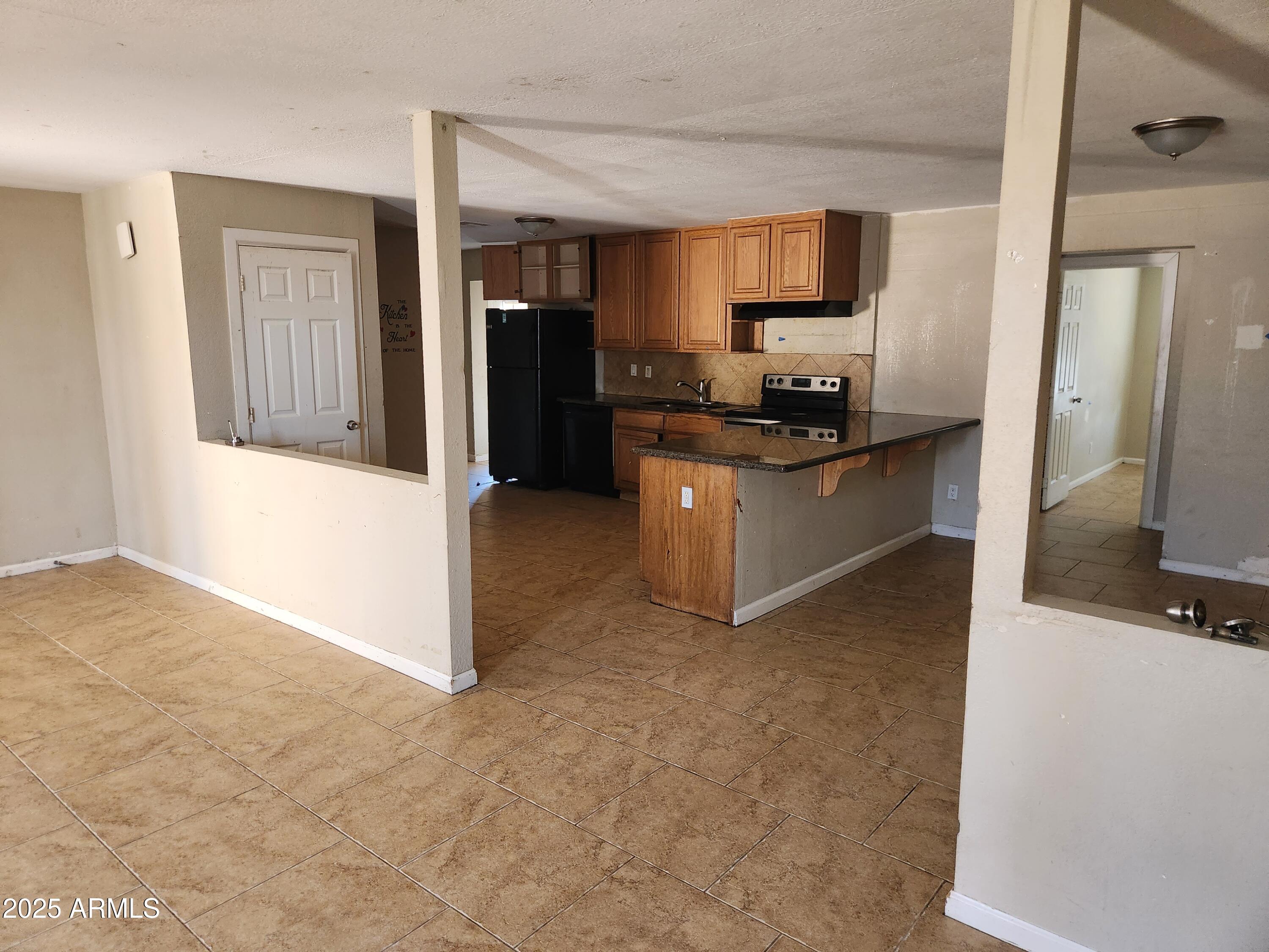 Homes 1 6017 W COLTER Street