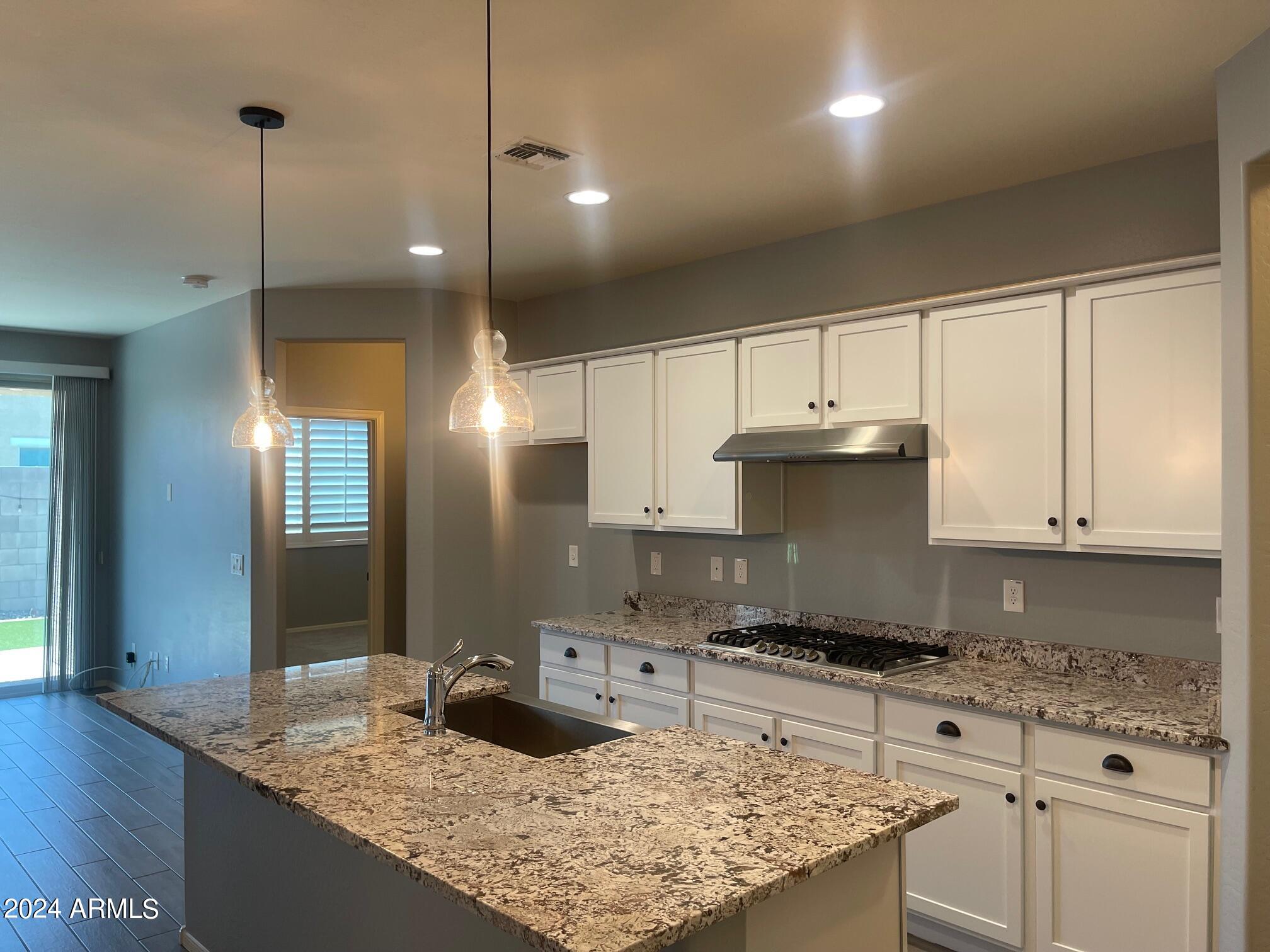 12219 W TETHER Trail