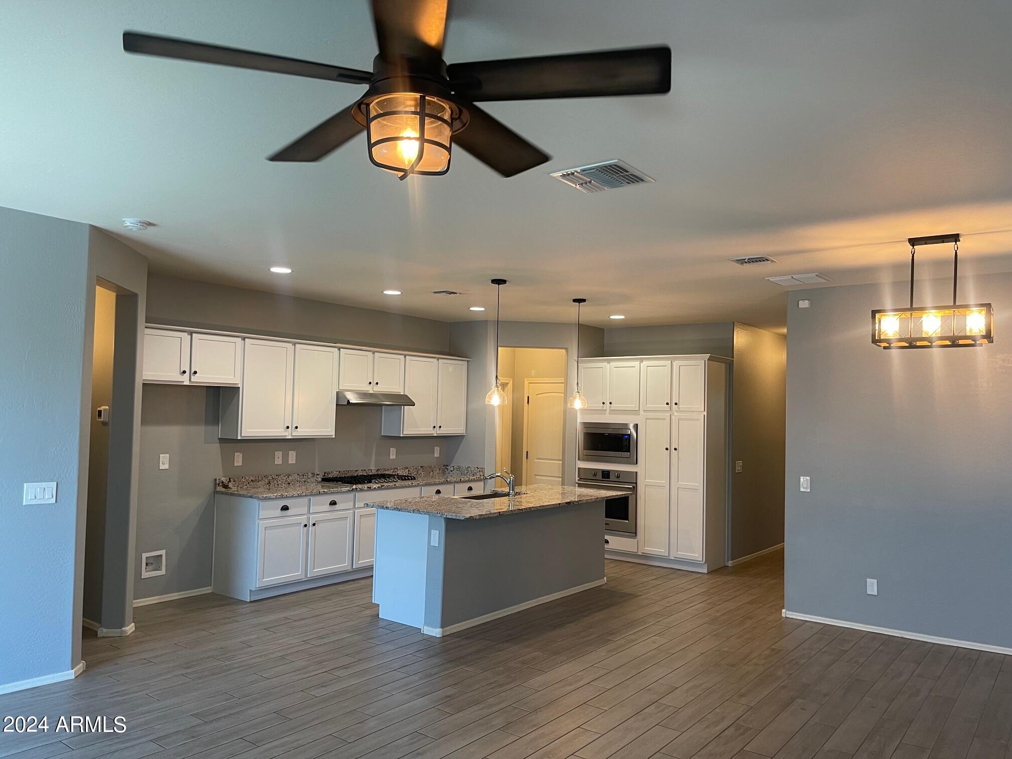 12219 W TETHER Trail