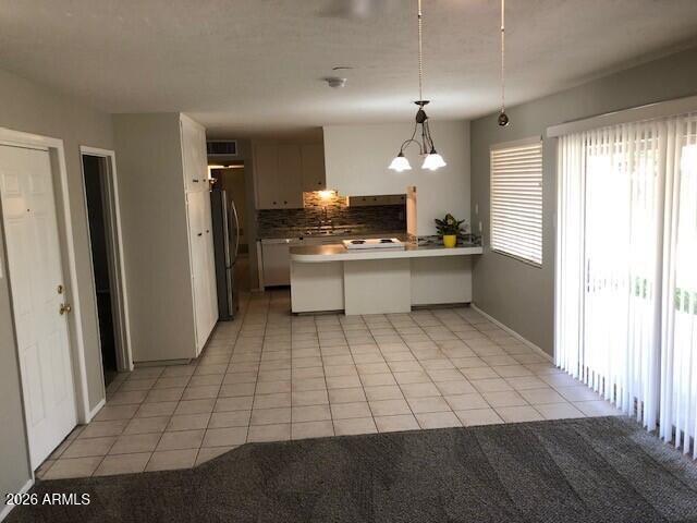 6901 E LATHAM Street