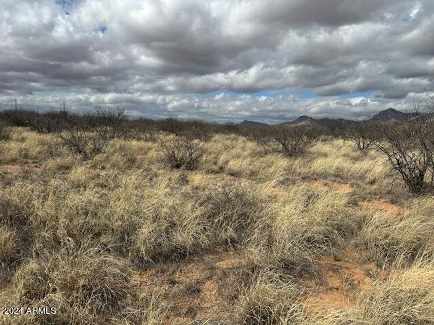 Build or sit your dream home on this Nearly 5 Acre parcel with  Panoramic Mountain Views ,2 well share, Electric close by. No H.O.A.