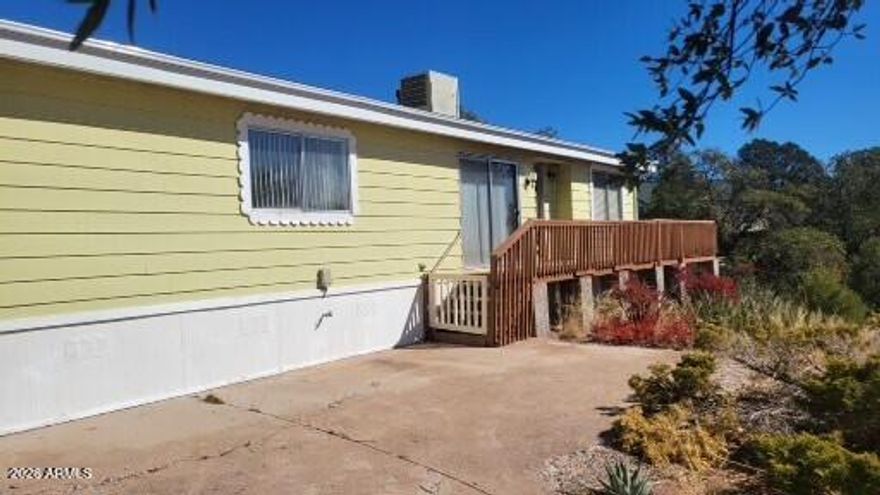 Charming Payson North home features 2 Bedroom 2 Bath, 1,344 sq.ft. NO HOA. Located on the north side of town providing easy access to shopping, hiking, fishing and outdoor recreation. Perfect for a full time residence or vacation getaways. Situated on an elevated lot with great views from windows and wraparound deck. Living room features beautiful wood burning stove for cooler nights. Roomy kitchen with ample cabinet space. Master bedroom with garden tub and separate shower. Inside laundry room with cabinets. Large storage shed. Newer hot water heater. New Roof with transferrable warranty. Spacious area in front to enjoy outdoor living. Home is in a desirable central location for those seeking a tranquil and scenic environment while remaining in a mountain town