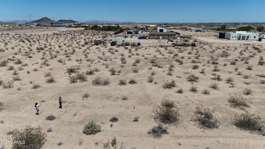 1 acre to build your dreams...far enough for peace & quiet, close enough to the paved road. Water may be available! Inquire with Global Water.