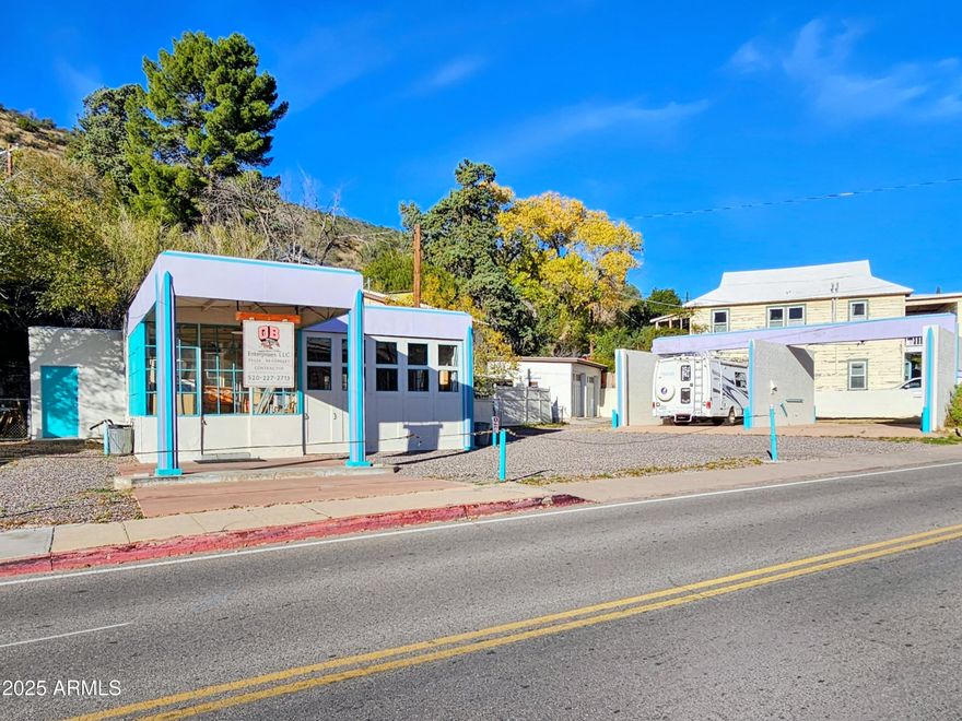 OLD BISBEE MIXED USE- Four Separate Structures for Commercial and Residential use on .27 Acre, Including a  Historic 1930's Service Station (converted to a Commercial Workshop, with 220 Amp Panel and ADA Compliant Bathroom), a Two Story 1024 sq ft Two Bedroom/One Bath Concrete Home built in 1945, a once functional Two Bay Carwash Structure, and a more recently constructed Two Car Garage. Easy, level access from Tombstone Canyon, with plenty of off street parking.
