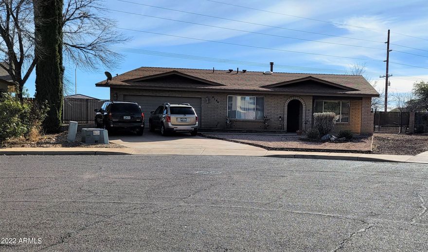 Look no further for that elusive 4 bedroom home with a big back yard! This home features a formal living and dining room as well as a family room and breakfast nook. You will love the laminate flooring in most of the living areas and baths. 3 of the bedrooms have carpet. The kitchen has lots of natural light and will be a delight to entertain in. There is a lovely master suite that is split from other bedrooms. It has a nice walk in closet, dressing area with the sinks and a walk in shower. Both baths have skylights. The backyard is awesome. 2 RV gates and 2 sheds. There is an above ground pool that you can put back up this summer. The mountain views are awesome! Call to see this special home today. $2000.00 flooring allowance with an acceptable offer.