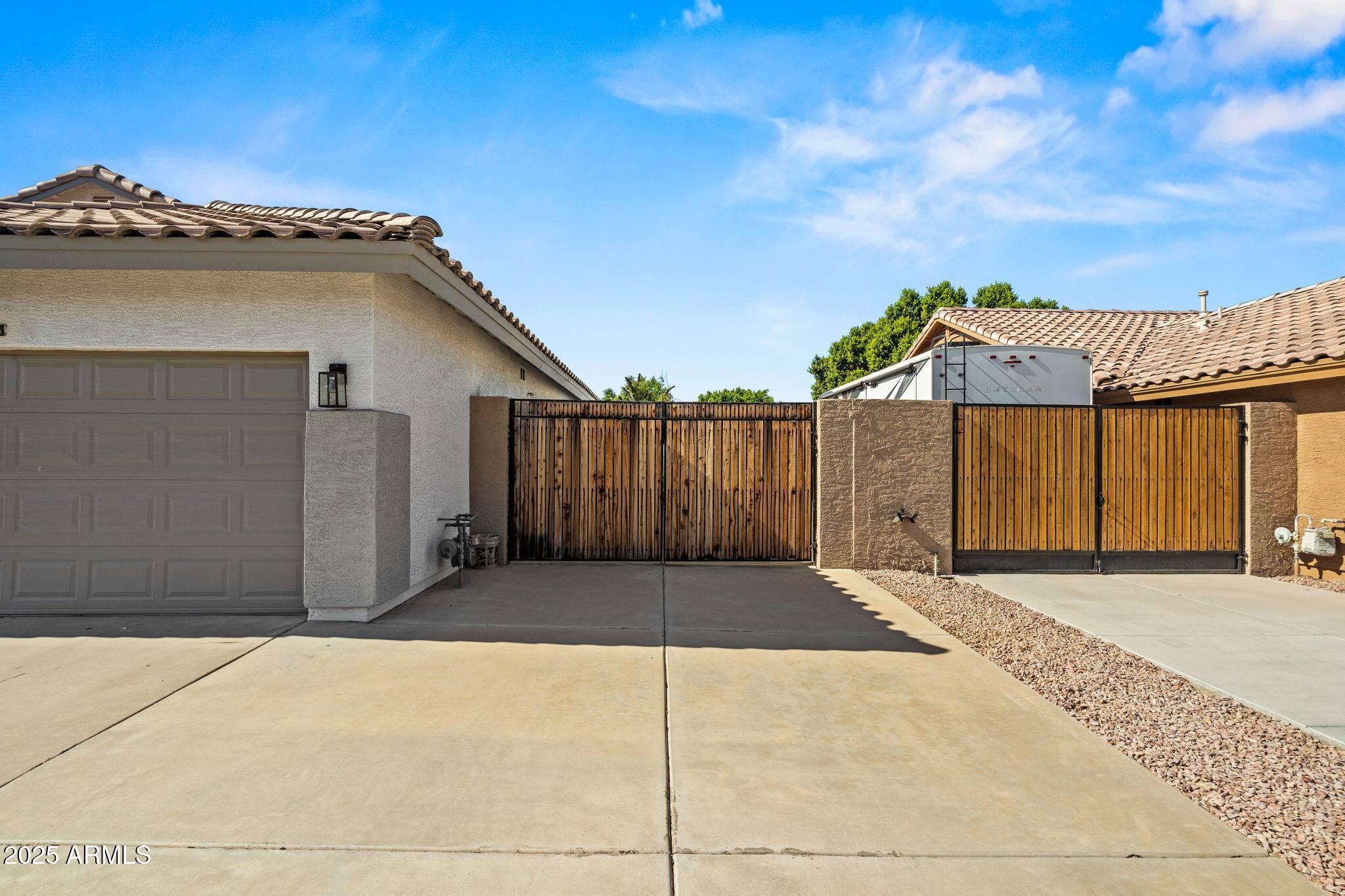 6935 W MONTE LINDO Street