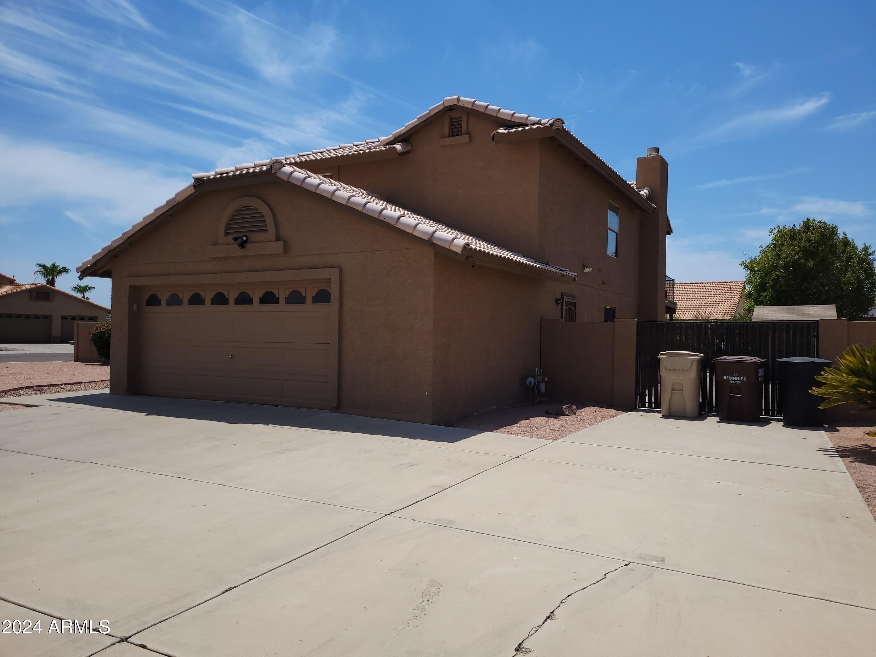 8729 W COLUMBINE Drive