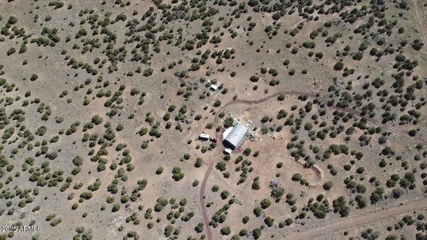 16 ACRES WITH 1-ACRE FULLY FENCED!!! * 14,000 DOLLAR BUFFALO BARN FENCE PROFESSIONALLY INSTALLED * OFF GRID (50X40) QUONET HUT HOME WITH SOLAR POWER, 2 1300 BURIED WATER CISTERNS & 1200 GALLON SEPTIC * SECOND LEVEL WAITING TO BE FINISHED * NEWER WOOD STOVE * 8 SOLAR PANELS W/12 & 24 VOLT SYSTEM * 2 PROPANE HEATERS * INTRICATE WATER CATCH SYSTEM * 2 250 GALLON WATER TOTES * 20 YARDS OF LAYED GARDENING DIRT * FURNISHED *