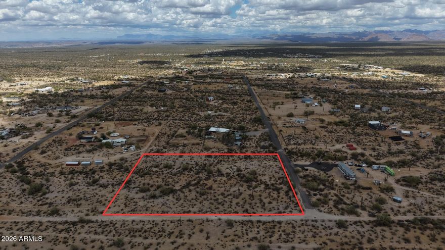 Don't miss this gorgeous desert ranchette corner parcel! Sitting on 3.31 acres, this property offers the perfect opportunity to build your custom home or hold as a smart long-term investment. Enjoy stunning mountain views and the added privacy of being directly across from BLM land. With an asphalt road for easy access, electricity available at the road, and established homes nearby, this lot combines convenience with wide-open desert living. Bring your vision and make it your own!