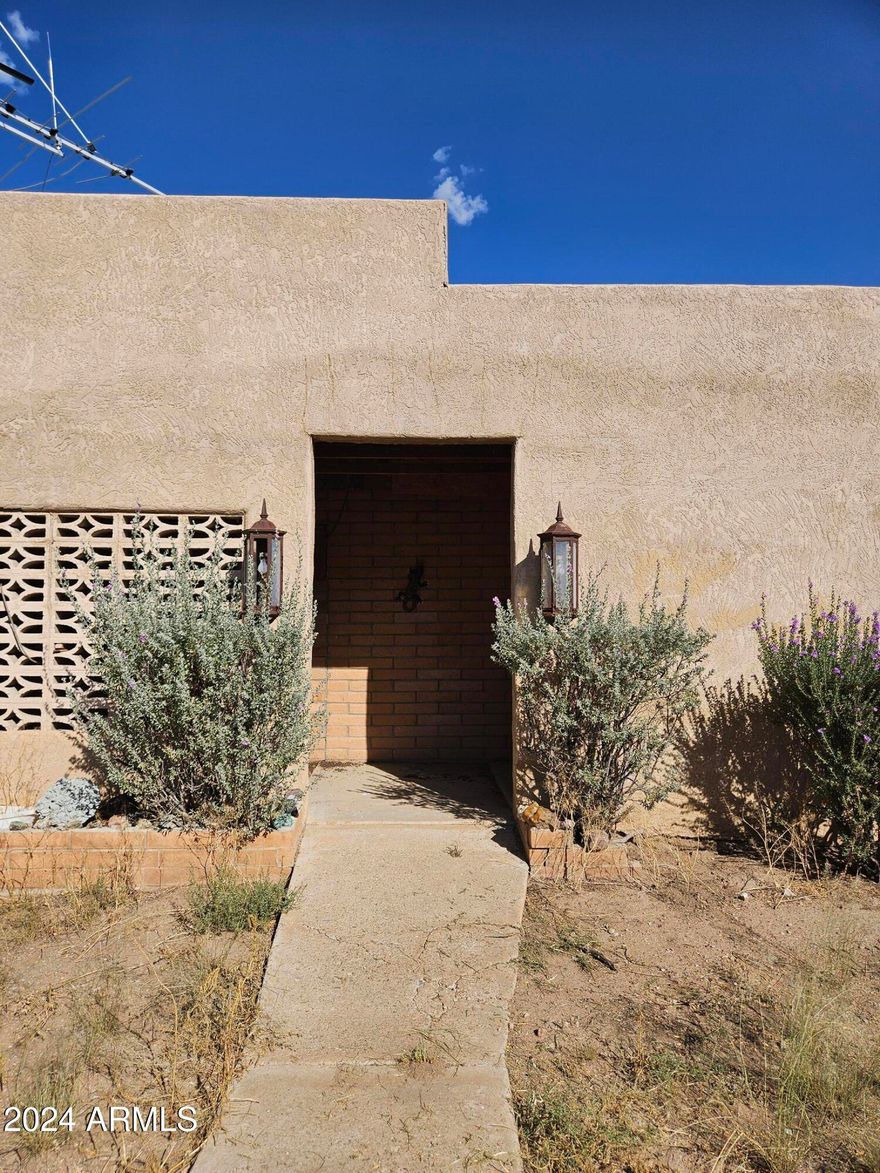 A very unusual property! Airplane Hangar with in ground oil change station and an approximate 1/2 mile dirt runway on 80 Acres. One site built house and one manufactured home. Multiple outbuildings and storage buildings. Chicken coop, livestock pens and shelters. Dry Pond on property.