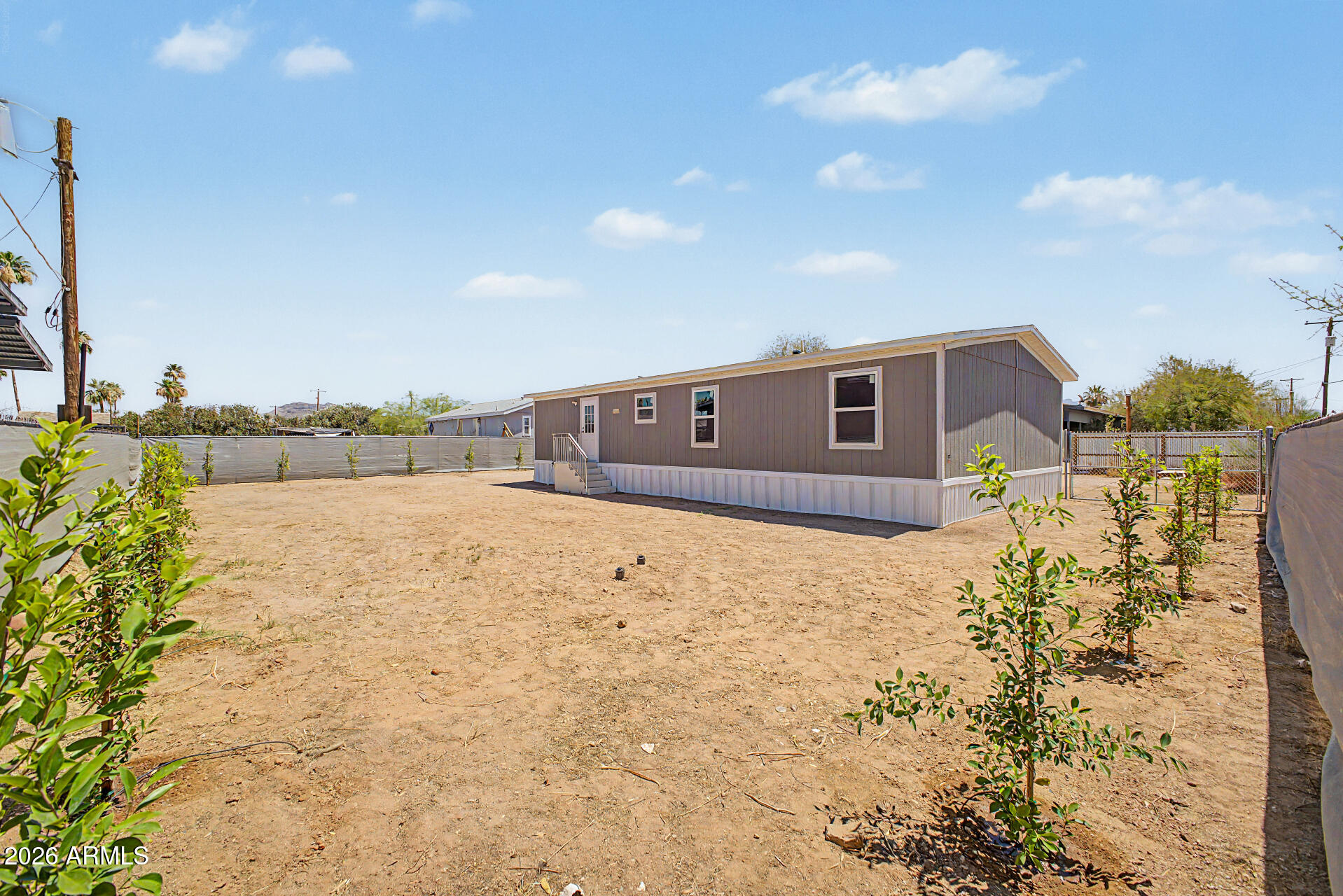 DESERT VILLAGE 2 LT 1-22,54-56,141-152&TR B&C subdivision, and MCR 7725. - Residential